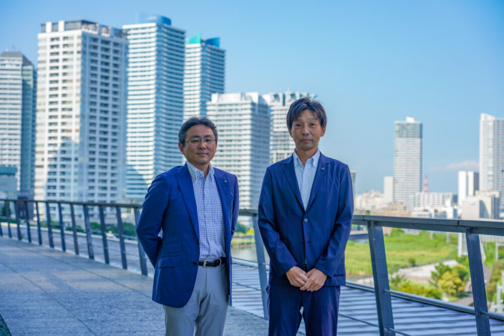 日産自動車株式会社 e-POWERプロジェクト推進グループ パワートレイン主管 羽二生 倫之氏(左)、株式会社日産オートモーティブテクノロジー 車両プロジェクト統括部 車両計画グループ 間口 和浩氏(右)